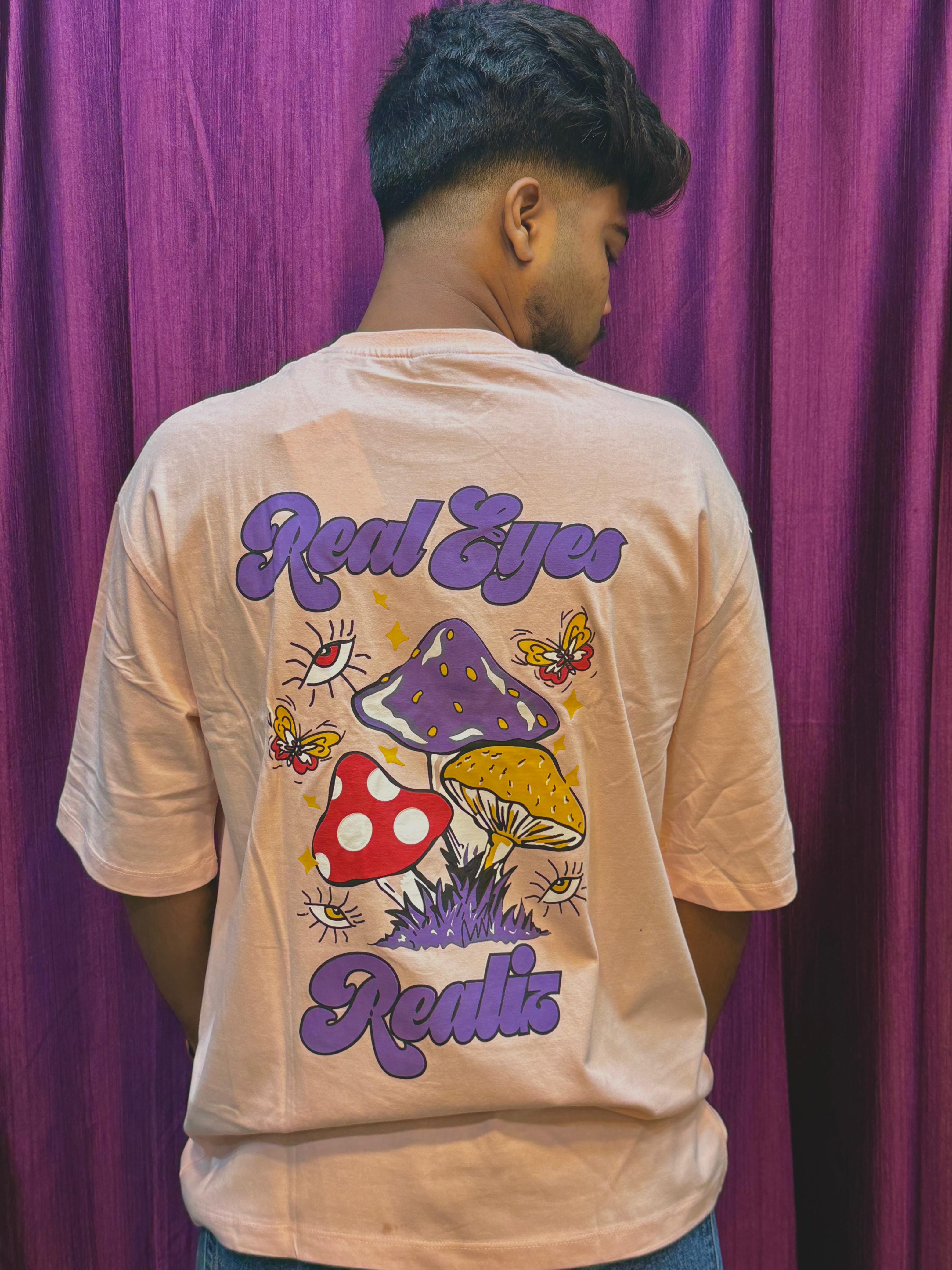 Real Eyes Realize Graphic Oversized T-Shirt – Peach Pink Edition